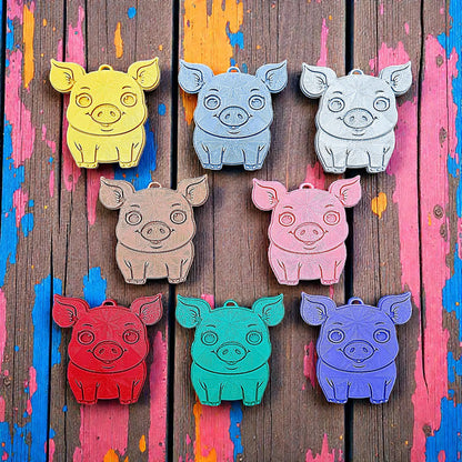 Handmade and customizable pig keychains in multiple colors, ideal for country themed part favors, cute bag charms, and classroom prizes.