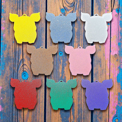 Reverse of handmade and customizable pig keychains, ideal for country themed part favors, cute bag charms, and classroom prizes.