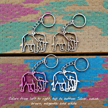 Handmade and customizable safari elephant keychains in various colors, perfect for classroom prizes, party favors for kids birthdays, baby showers and unique stocking stuffers.