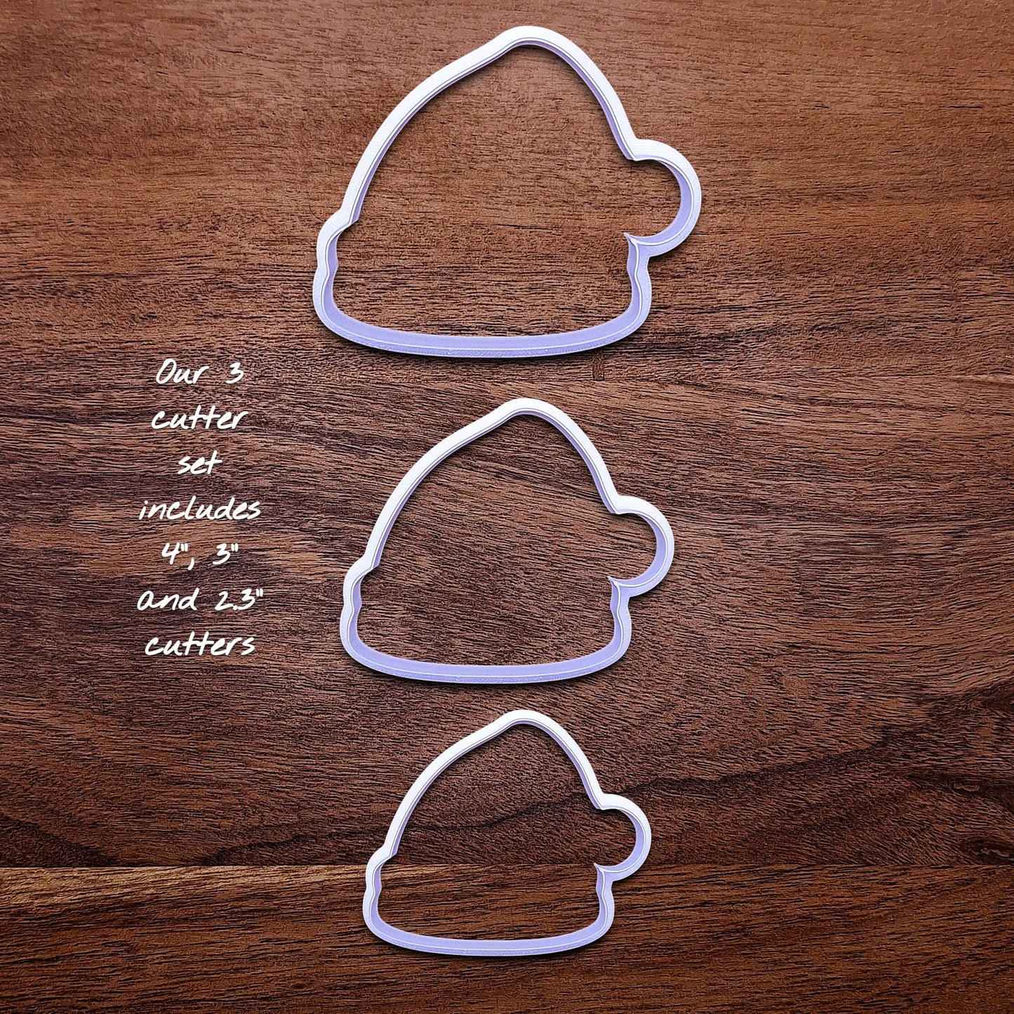 Santa hat cookie cutter set in three sizes, perfect for Christmas cookies, festive fondant toppers, or Xmas holiday crafts.