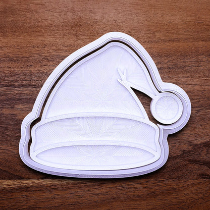 Santa hat cookie cutter and stamp, perfect for Christmas cookies, festive fondant toppers, or Xmas holiday crafts.