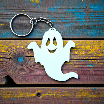 Handmade spooky Halloween ghost keychain, ideal for fall party favors, gifting, or accessorizing Halloween-themed trick or treat bags or keys.