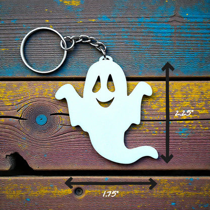 Handmade spooky Halloween ghost keychain in white, ideal for fall party favors, gifting, or accessorizing Halloween-themed trick or treat bags or keys.