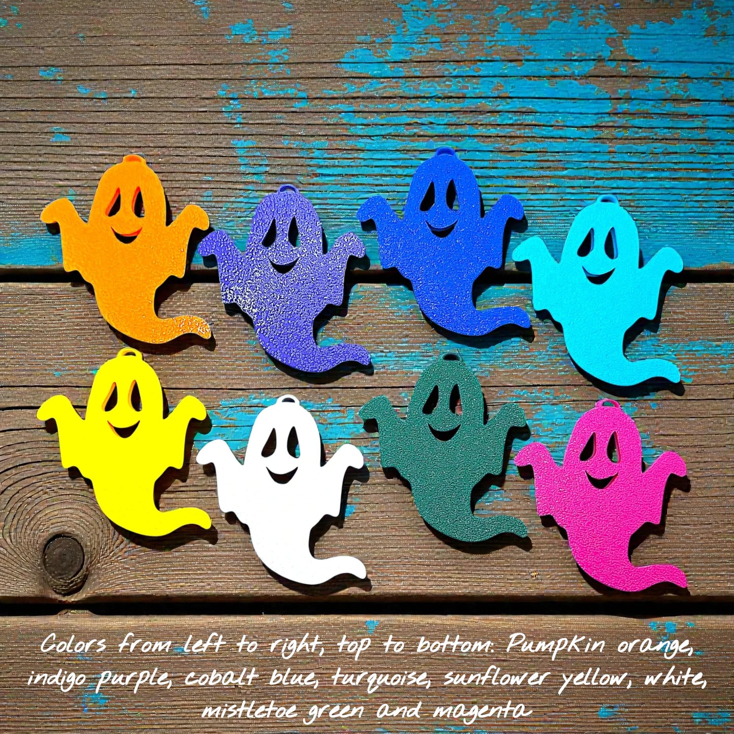 Front of handmade spooky Halloween ghost keychain in white, ideal for fall party favors, gifting, or accessorizing Halloween-themed trick or treat bags or keys.