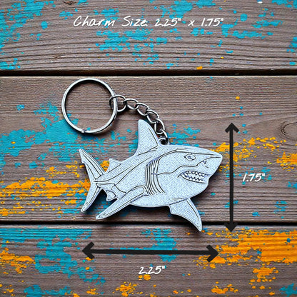 Handmade and customizable shark keychain in silver perfect for under-the-sea party favors, bag charms, and cool classroom prizes.