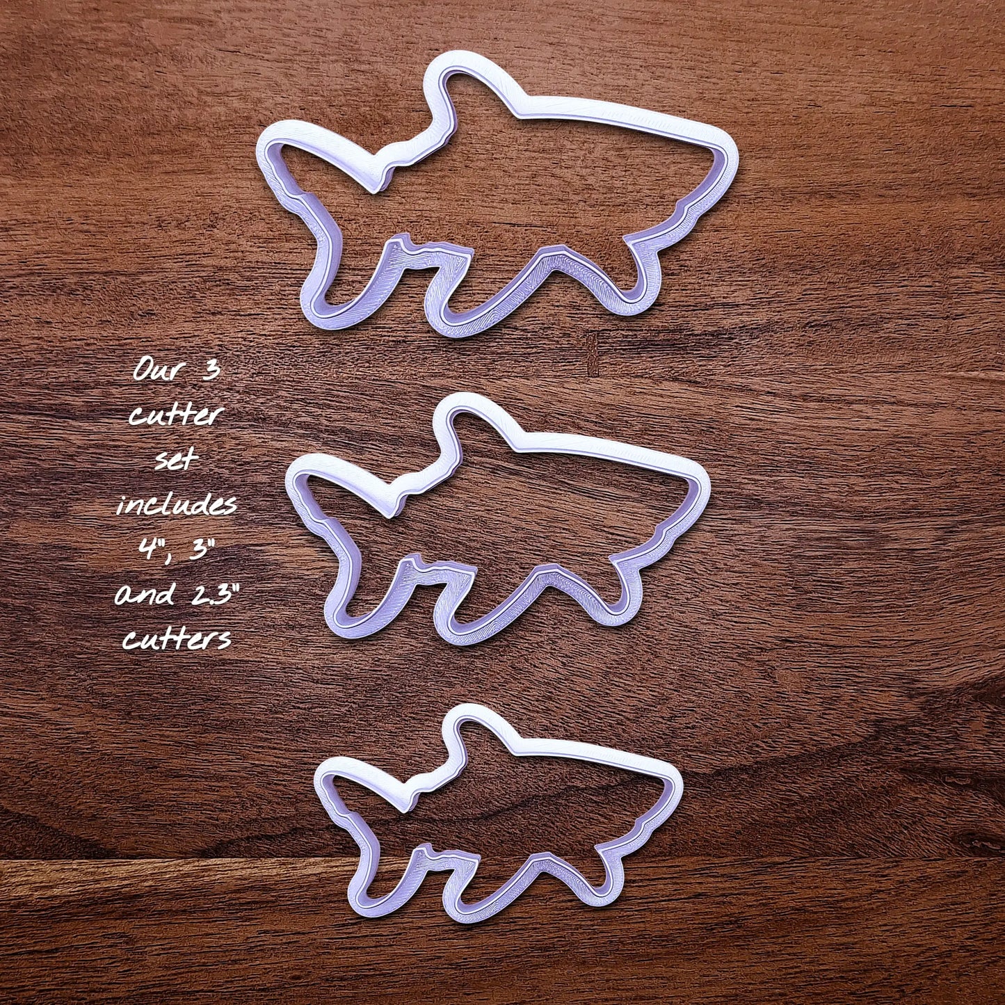 Handmade and customizable shark cookie cutter set, great for beach themed baking, fondant crafts, or ocean-themed cookies.
