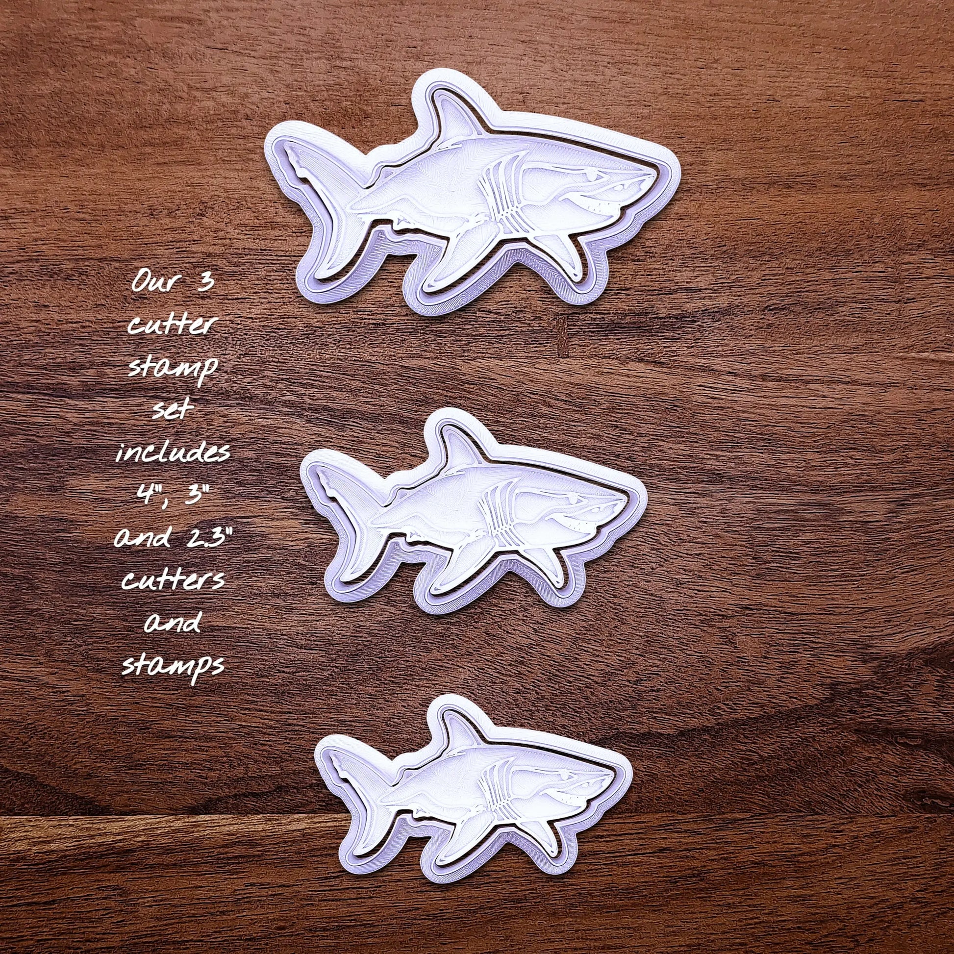 Handmade and customizable shark cookie cutter and stamp set, great for beach themed baking, fondant crafts, or ocean-themed cookies.