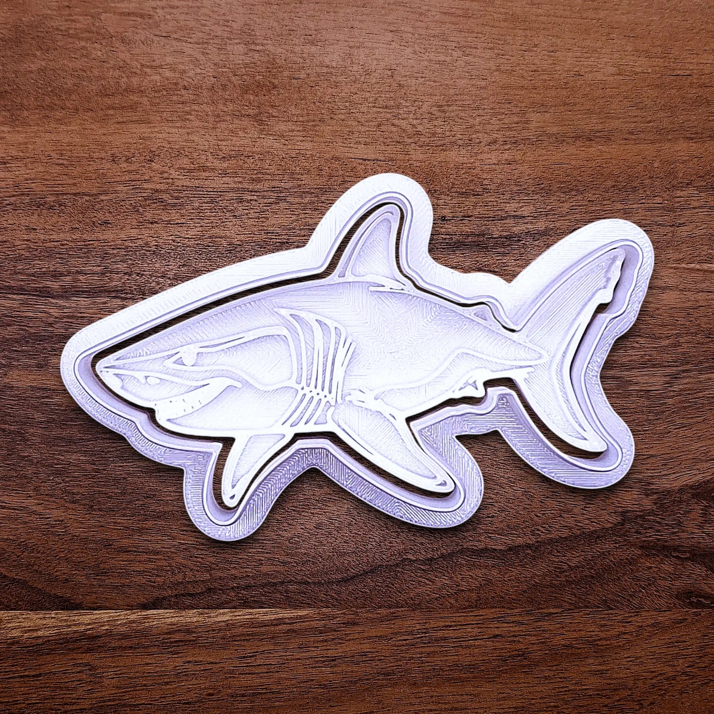 Handmade and customizable shark cookie cutter and stamp, great for beach themed baking, fondant crafts, or ocean-themed cookies.