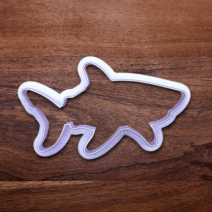 Handmade and customizable shark cookie cutter, great for beach themed baking, fondant crafts, or ocean-themed cookies.