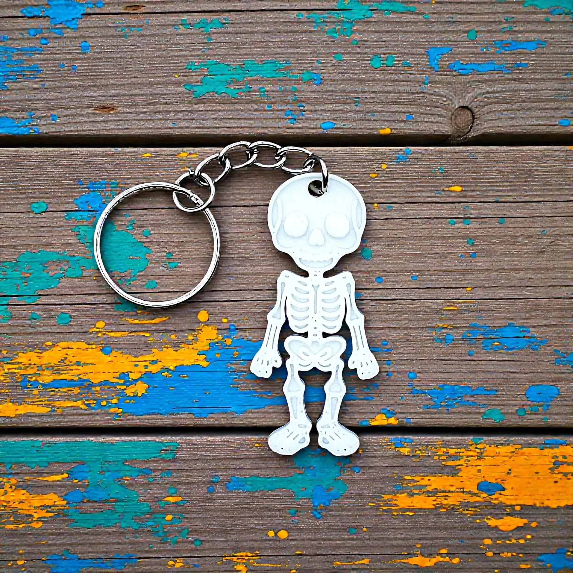 Handmade and customizable skeleton keychain, perfect for Halloween party favors, spooky bag charms, and cool classroom prizes.
