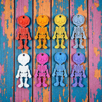 Handmade and customizable skeleton keychains in various colors, perfect for Halloween party favors, spooky bag charms, and cool classroom prizes.