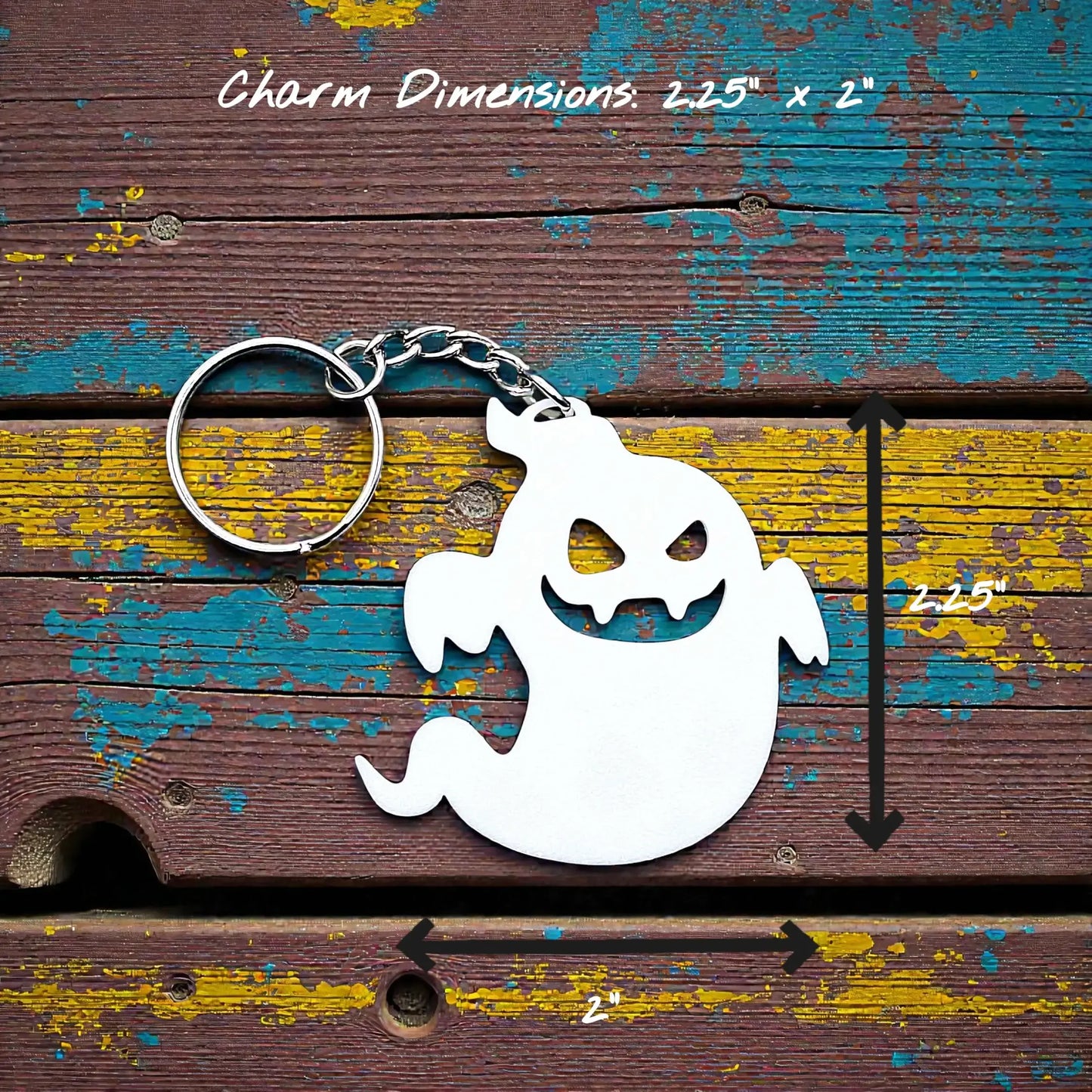 Handmade and spooky Halloween ghost keychain in white, ideal for fall party favors, gifting, or accessorizing Halloween-themed trick or treat bags or keys.