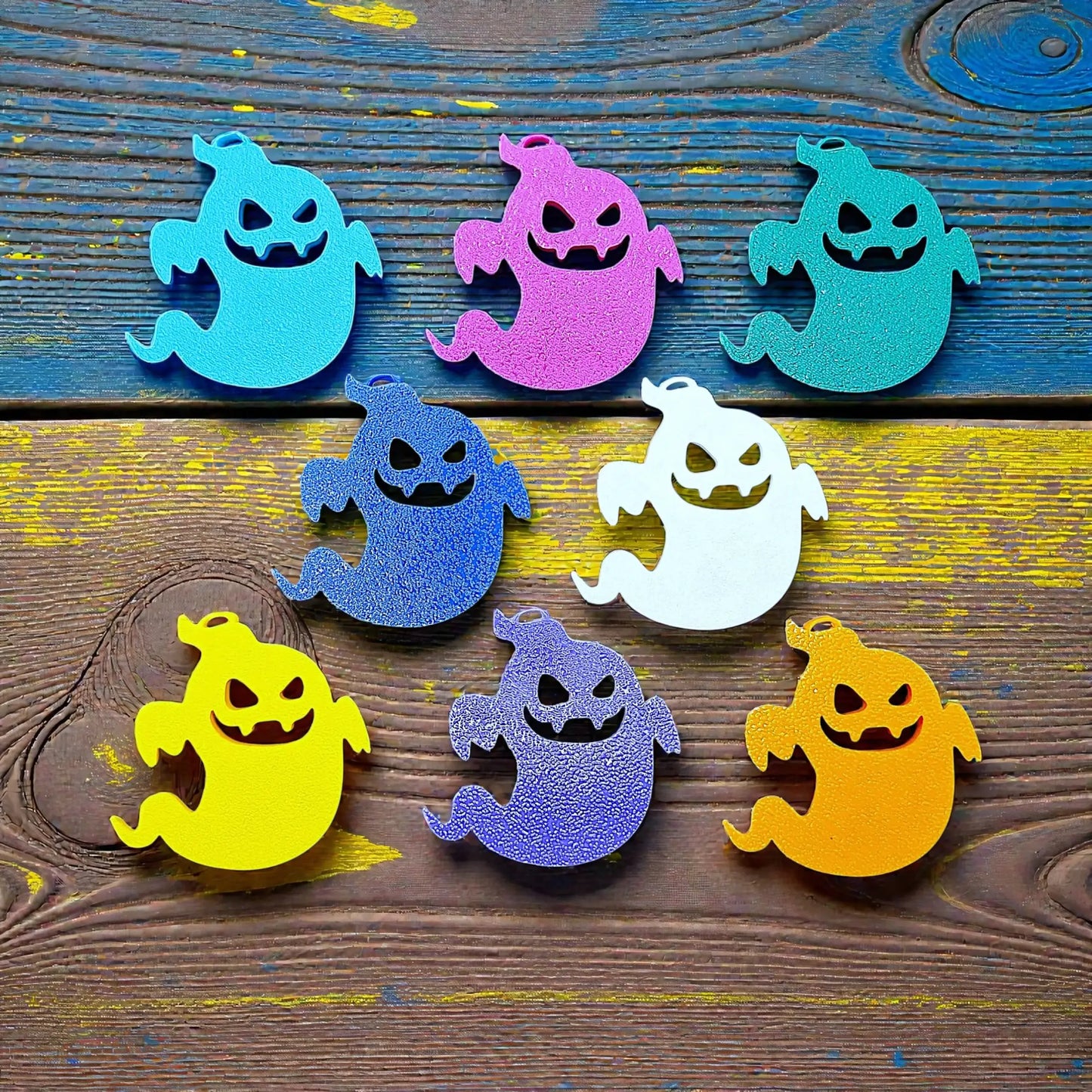 Handmade and spooky Halloween ghost keychains in customizable colors, ideal for fall party favors, gifting, or accessorizing Halloween-themed trick or treat bags or keys.