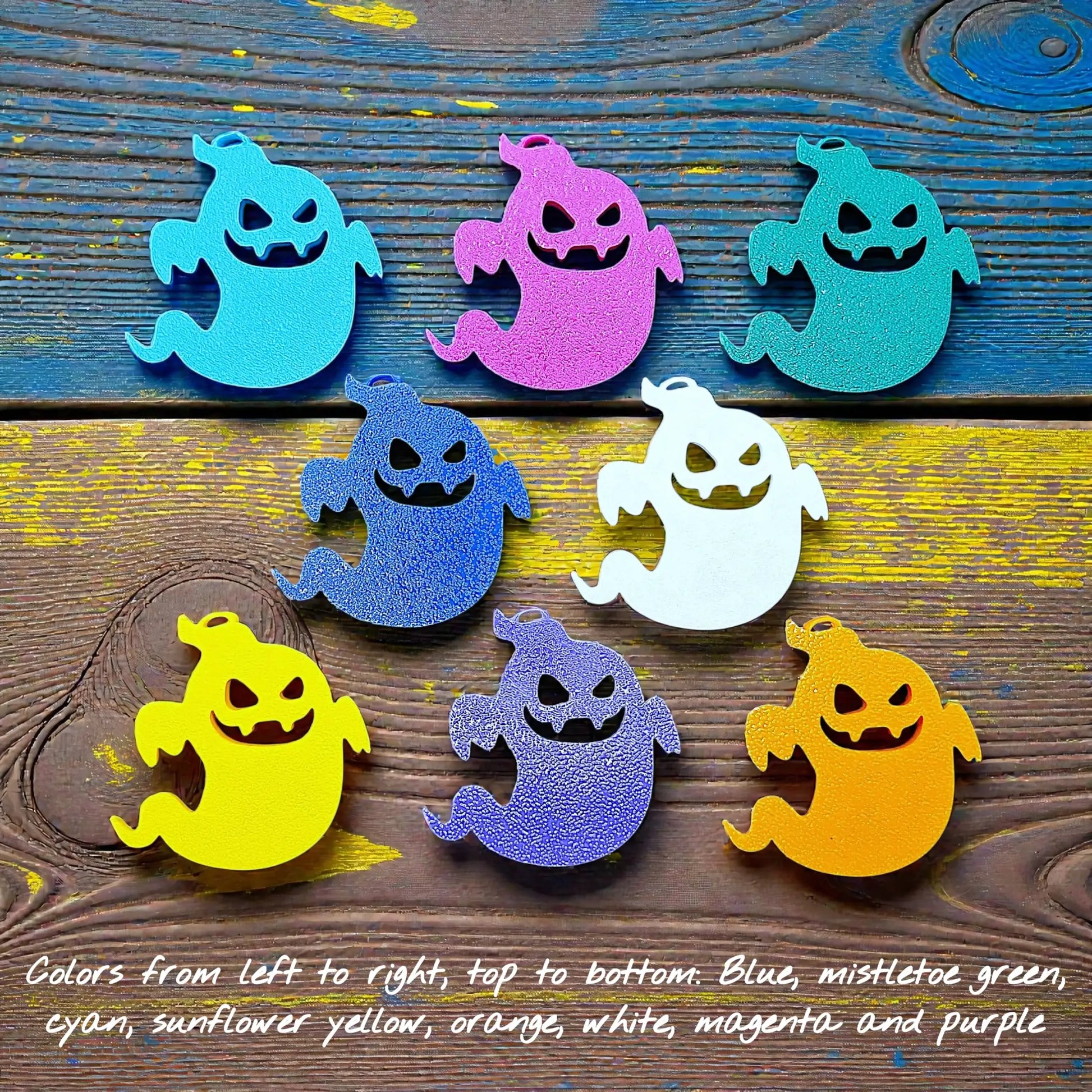 Handmade Halloween ghost keychains in various colors, ideal for fall party favors, gifting, or accessorizing Halloween-themed trick or treat bags or keys.