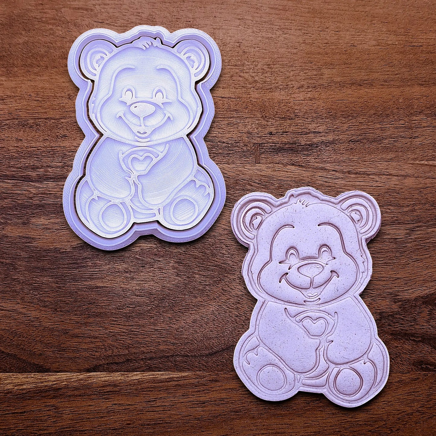 Handmade and customizable Teddy Bear Cookie Cutter and Stamp alongside a dough cutout and imprint, perfect for Valentine's Day cookies, sweet treats for special occasions and fun kid-friendly crafting activities.