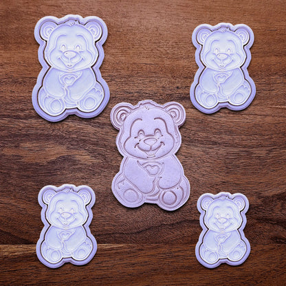 Handmade and customizable Teddy Bear Cookie Cutters and Stamps alongside a dough cutout and imprint, perfect for Valentine's Day cookies, sweet treats for special occasions and fun kid-friendly crafting activities.