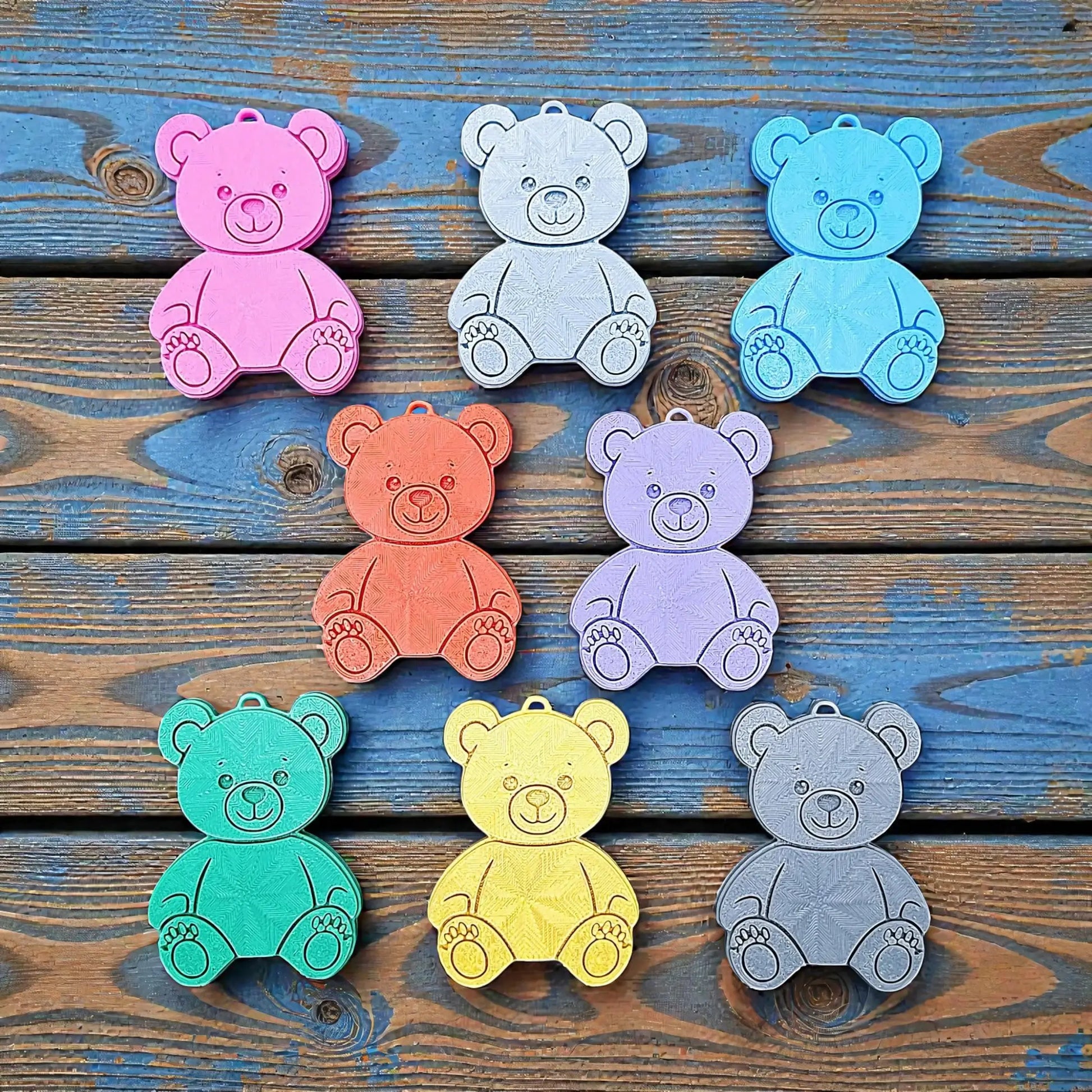 Colorful teddy bear keychains in various colors - handmade eco-friendly charms perfect for kids, baby showers, party favors, or animal-themed gifts.