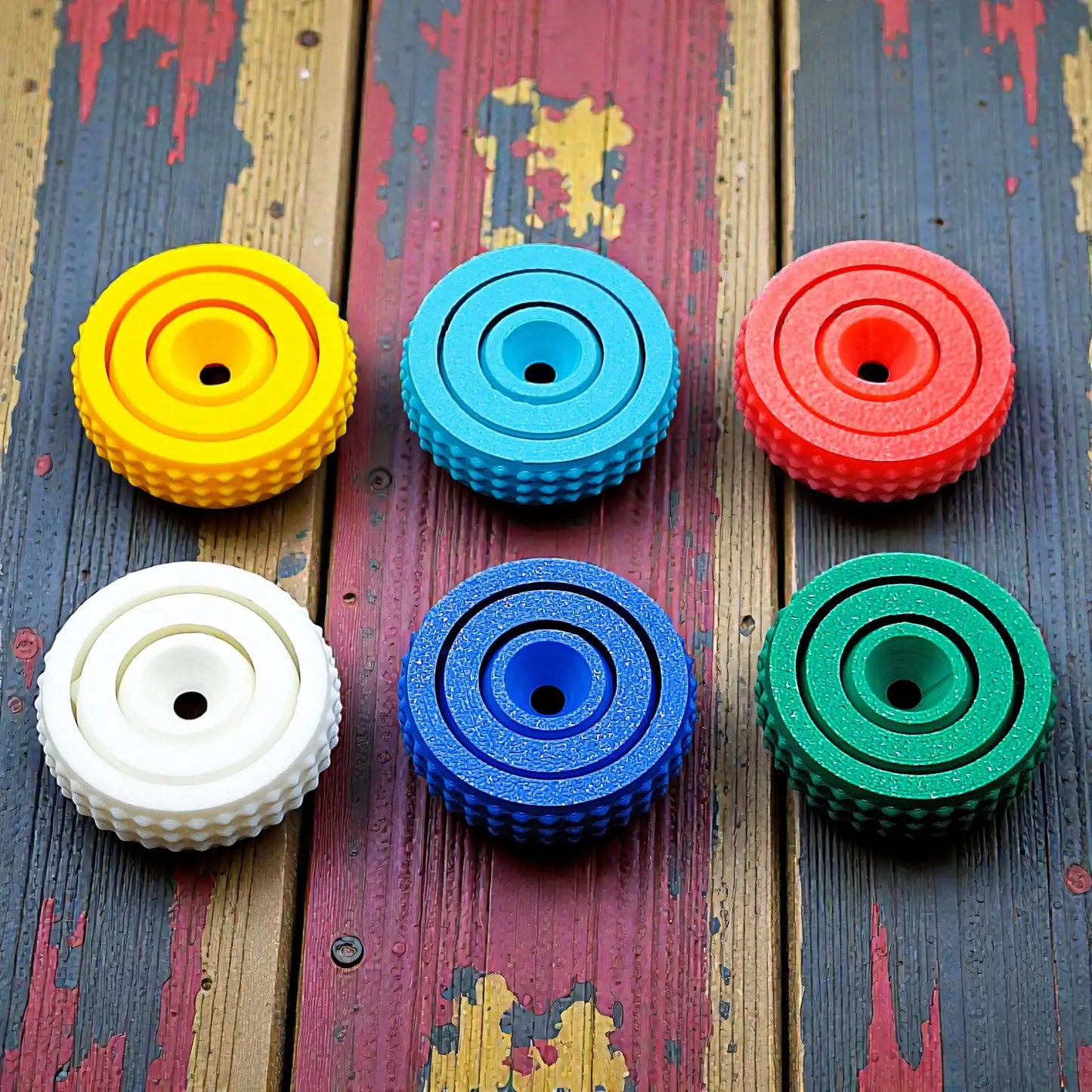 Six fidget gyro spinners with modern designs and smooth spin, handmade from eco PLA, great for stress relief, sensory play, and focus support.