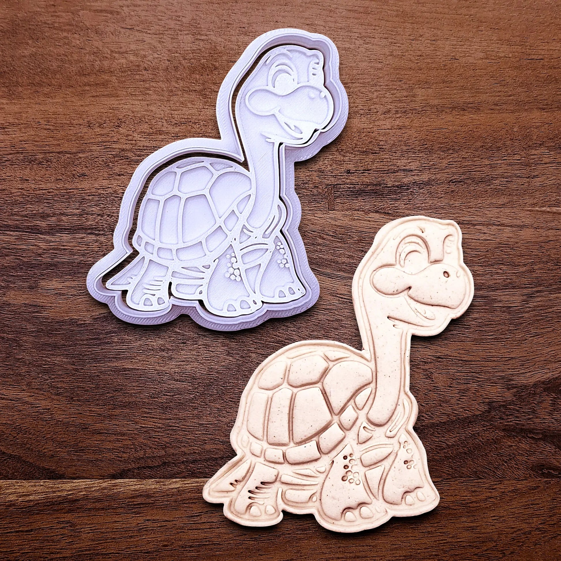 Handmade and customizable turtle cookie cutter alongside a dough imprint, ideal for ocean-themed baking, birthday party treats, or handmade gift ideas.