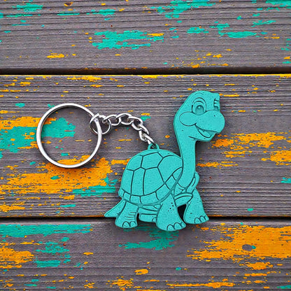 Handmade and customizable turtle keychains in multiple colors, ideal for tortoise themed part favors, cute bag charms, and classroom prizes.