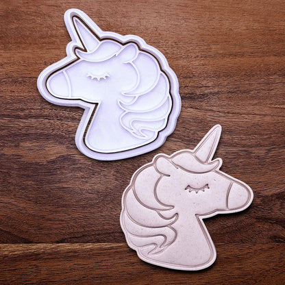 Handmade and customizable unicorn cookie cutter and stamp alongside a dough cutout and imprint, perfect for magical themed birthday parties, fondant decorating, or gifting to unicorn lovers.