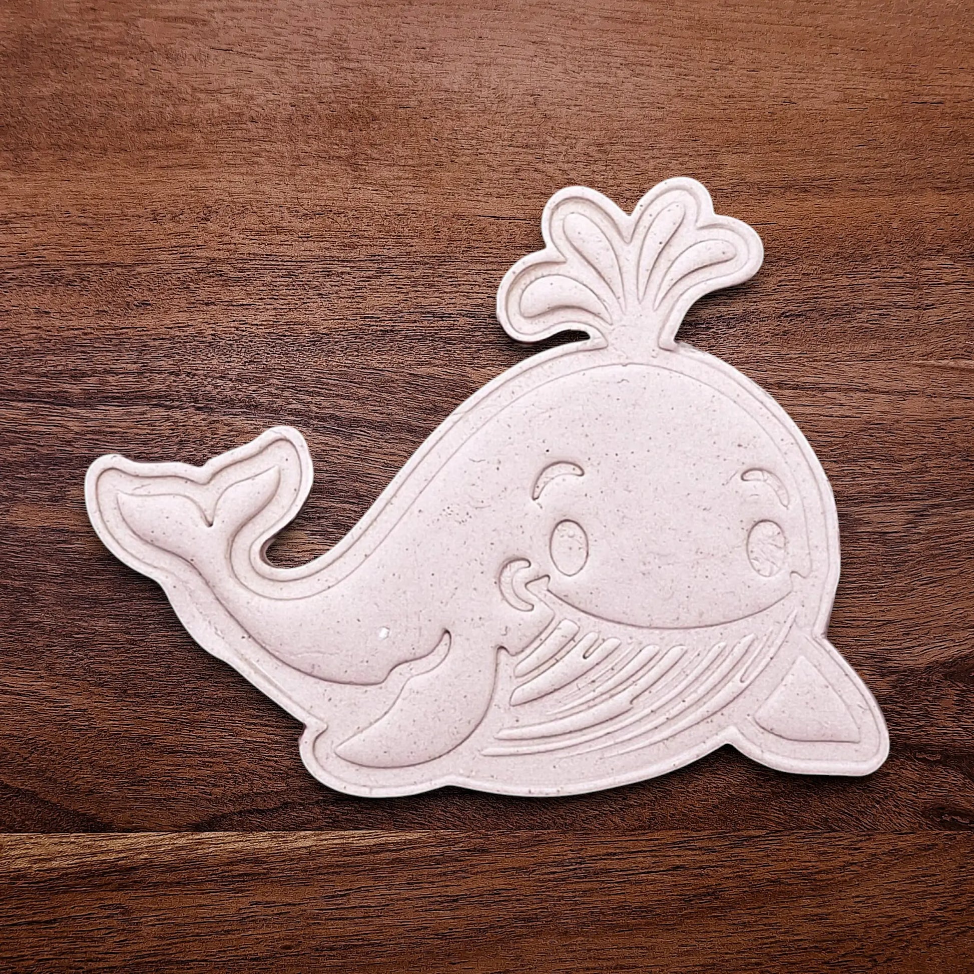 Handmade and customizable whale cookie cutter dough cutout and imprint, ideal for making adorable aquatic and nautical cookies for baby showers, birthdays, and parties.