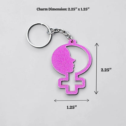 Handmade and customizable women empowerment keychain in magenta, perfect for event giveaways and gifts for feminists.