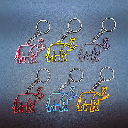 Front-facing view of six colorful elephant keychains, handmade in eco PLA plastic, perfect for animal lovers, party favors, or wildlife-themed gifts.
