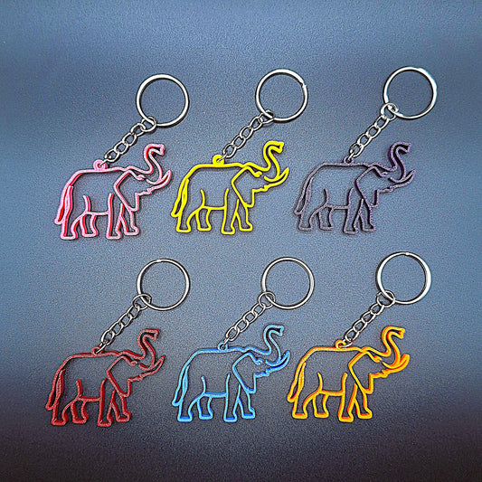 Front-facing view of six colorful elephant keychains, handmade in eco PLA plastic, perfect for animal lovers, party favors, or wildlife-themed gifts.