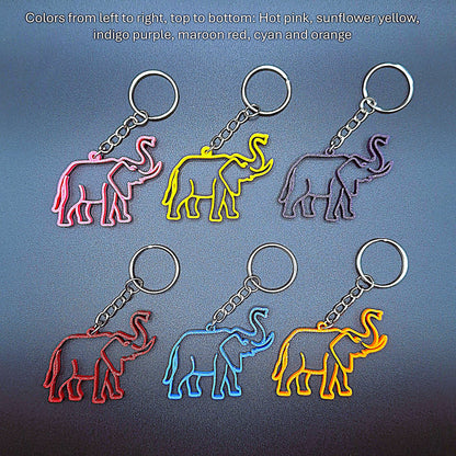 Six elephant keychains shown in assorted colors with raised trunk design, great as eco-friendly gifts or fun animal-themed key rings.
