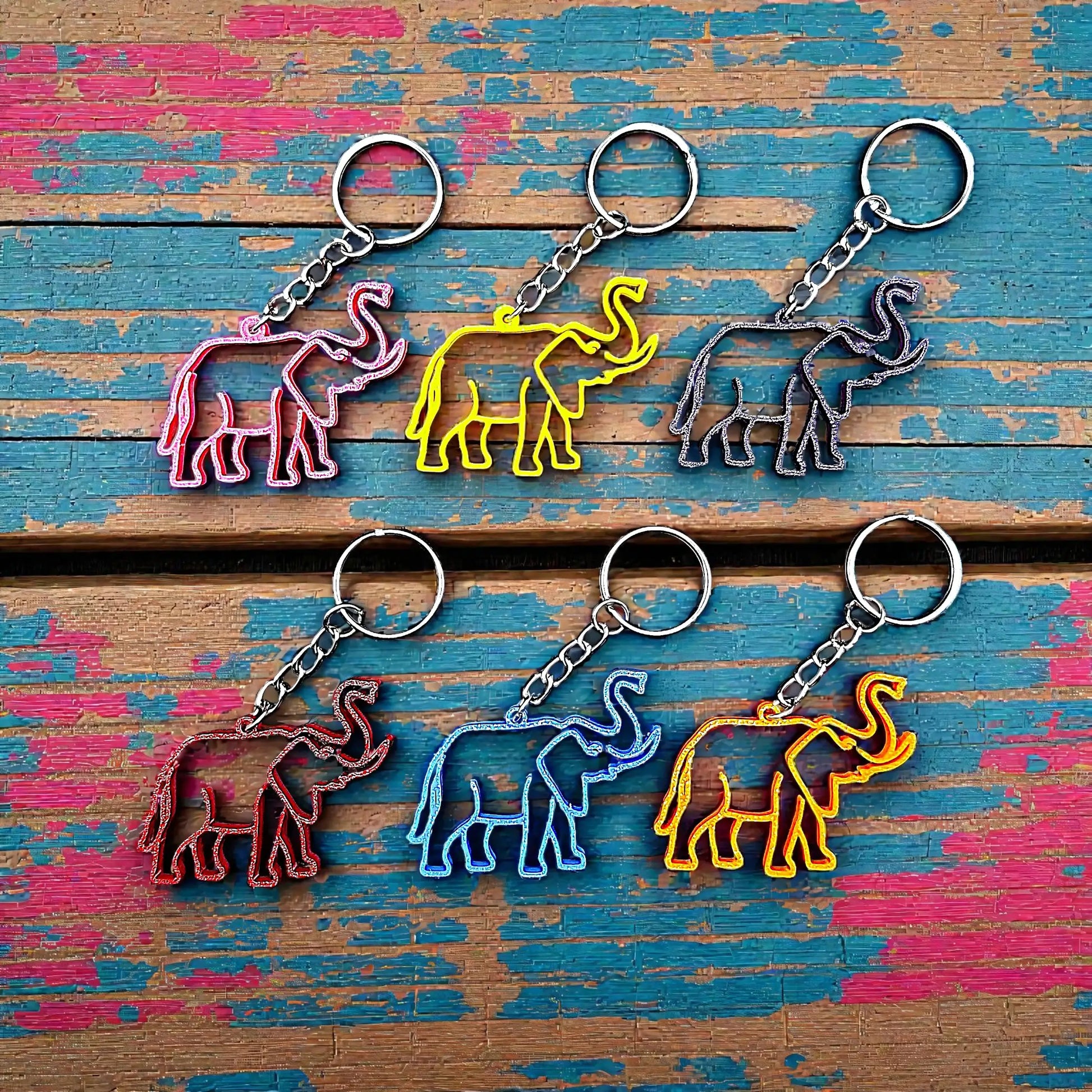 Handmade and customizable safari elephant keychain in various colors, perfect for classroom prizes, party favors for kids birthdays, baby showers and unique stocking stuffers.