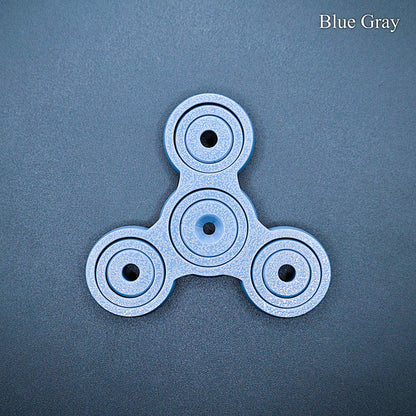 Sleek blue gray 3" pronged fidget spinner for desk, classroom, or travel use. Smooth, silent spin for focus and stress relief. Eco-friendly and handmade.