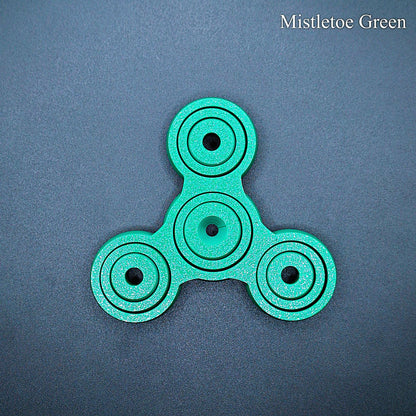 Mistletoe green 3" fidget gyro spinner with pronged design—great for anxiety, ADHD focus, and quiet sensory play. Handmade from PLA plastic.