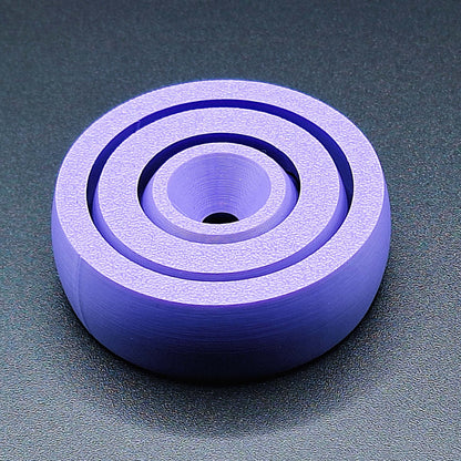 Top view of smooth-edge fidget spinner toy, designed for calming focus, handmade in the USA using sustainable, plant-based plastic.