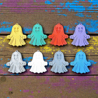 Handmade and customizable ghost keychains in various colors, perfect for Halloween party favors, trick or treats, and fun Fall gifting for kids.