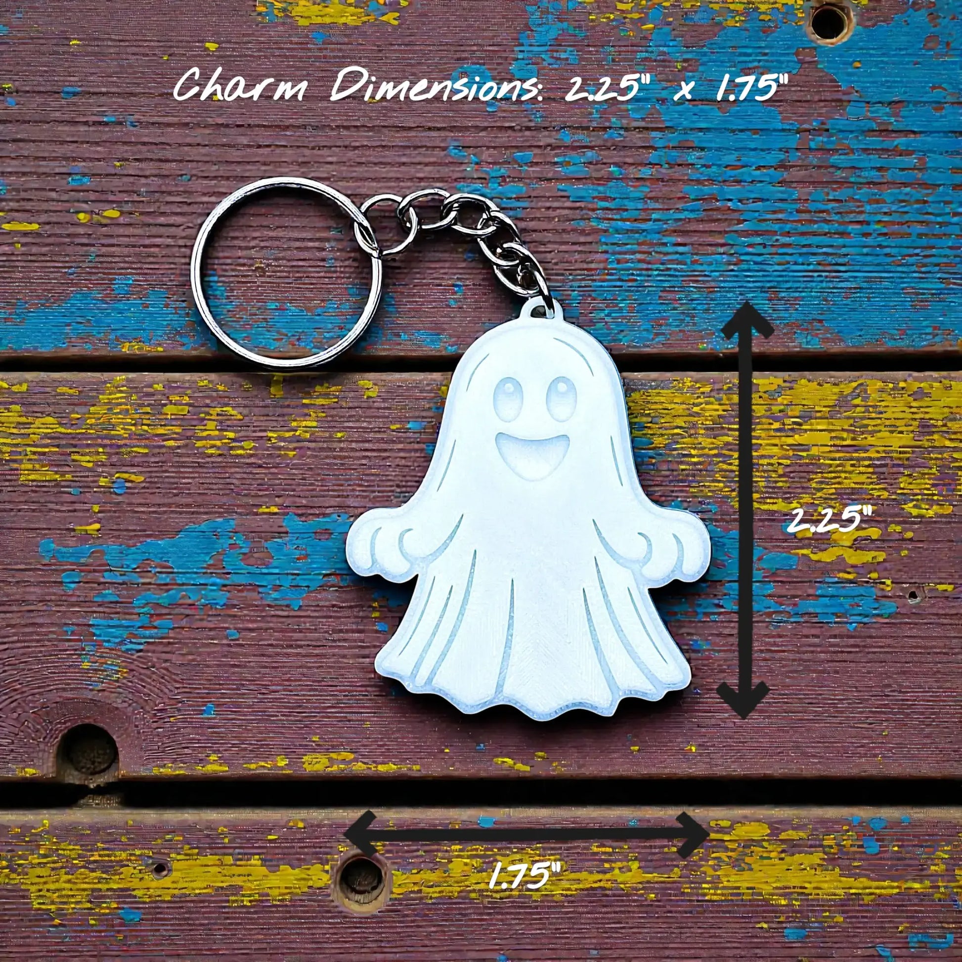 Handmade and customizable ghost keychain in white, perfect for Halloween party favors, trick or treats, and fun Fall gifting for kids.
