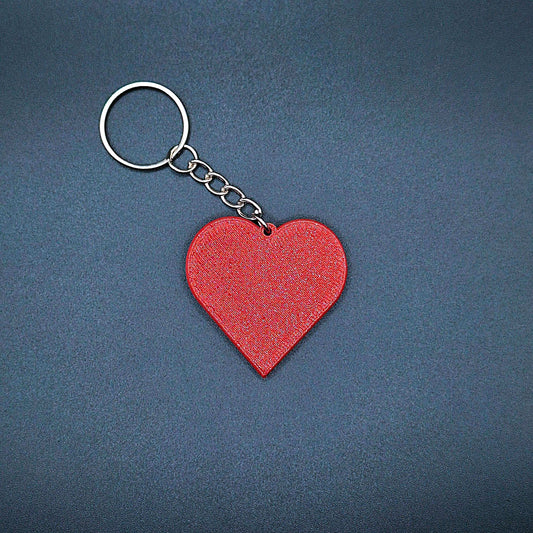 Handmade and customizable heart keychain in red, perfect for gifts, bag charms, and Valentine’s Day accessories.