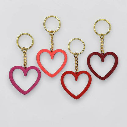 Heart keychains with gold keyrings, perfect for Valentine's Day gifts, wedding party favors, stocking stuffers and class prizes.