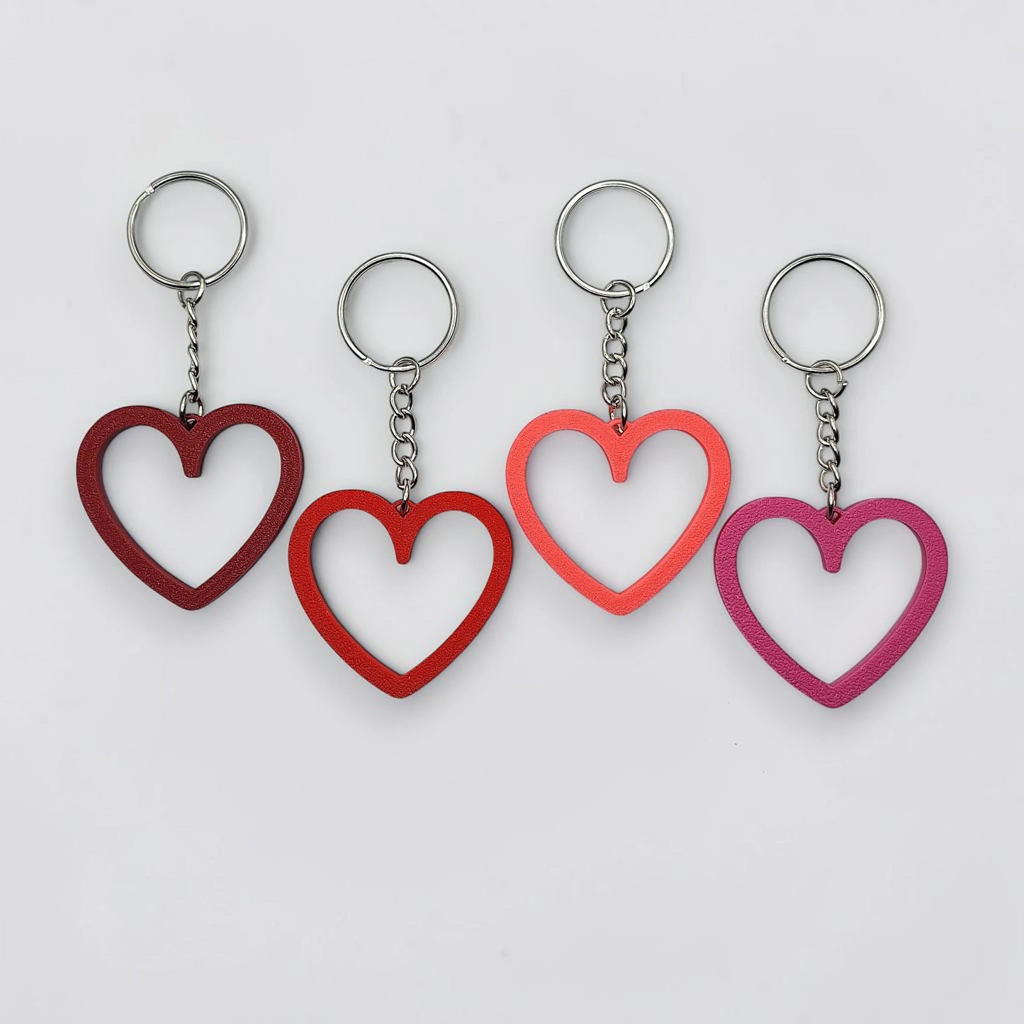 Eco-friendly heart keychains, perfect for Valentine's Day gifts, wedding party favors, stocking stuffers and class prizes.