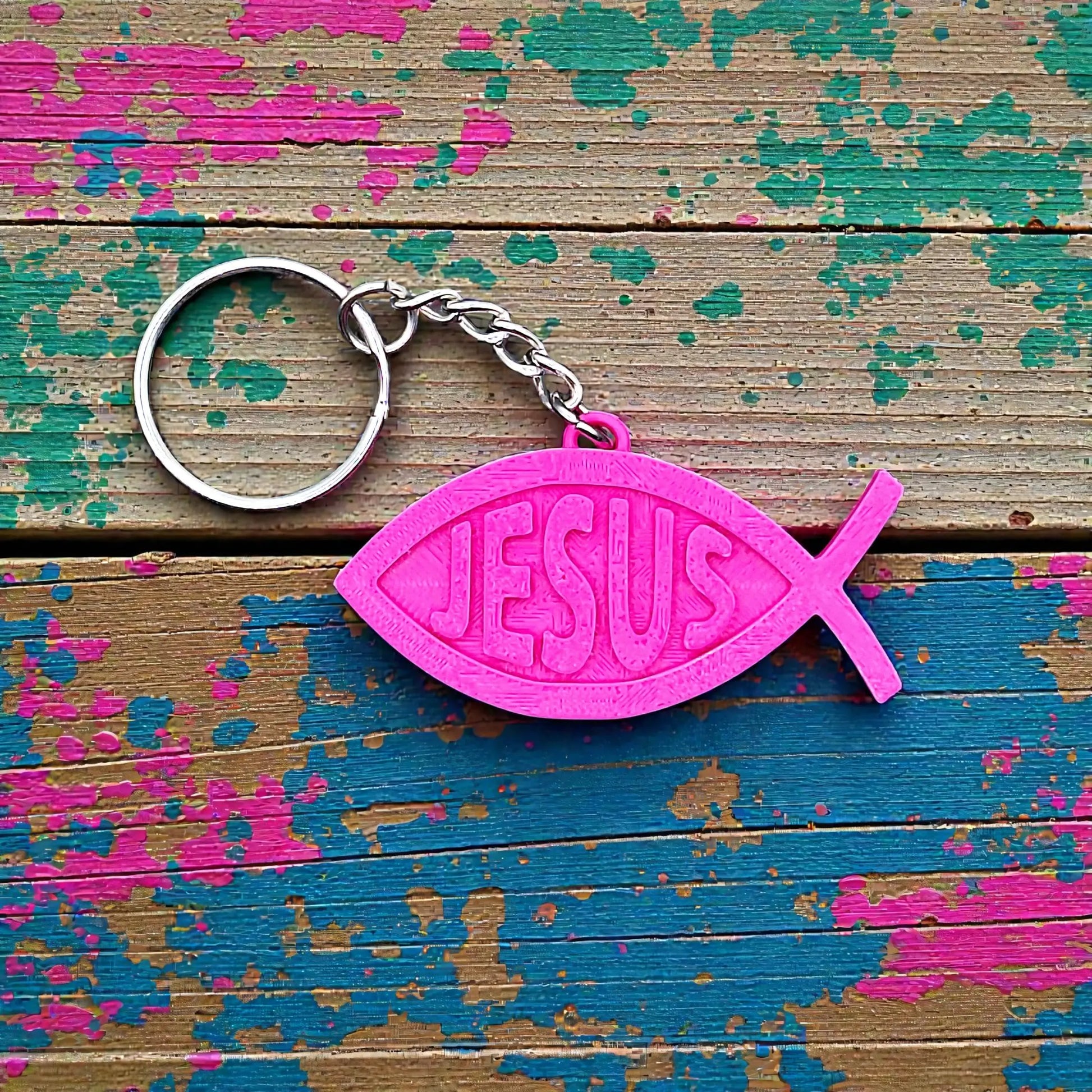 Christian Fish Keychain with “Jesus” in the center, handmade faith charm for Bible study, church gifts, or daily inspirational accessory.