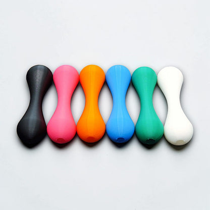 Top-down view of six knucklebone fidget skill toys made from eco-friendly PLA, great for focus, flipping tricks, and mindful fidgeting.