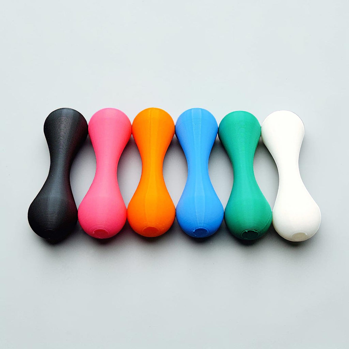 Six knucklebone fidget skill toys made from eco-friendly PLA, great for focus, flipping tricks, and mindful fidgeting.
