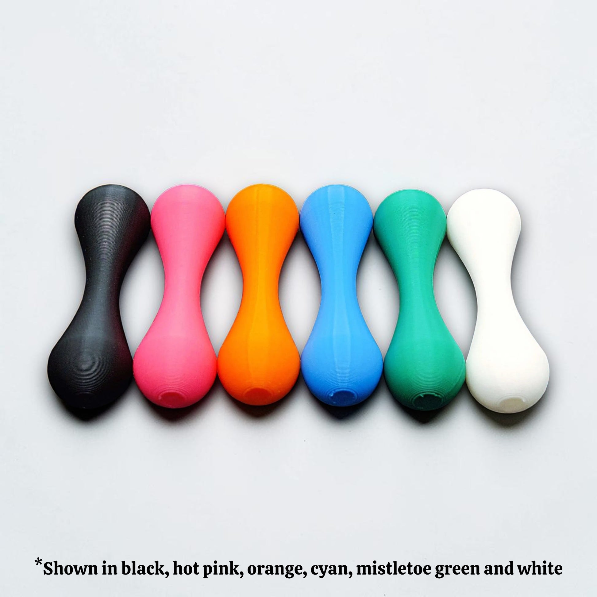 Side-by-side view of six knucklebone fidget toys in assorted colors, designed for smooth flipping and fun stress relief.