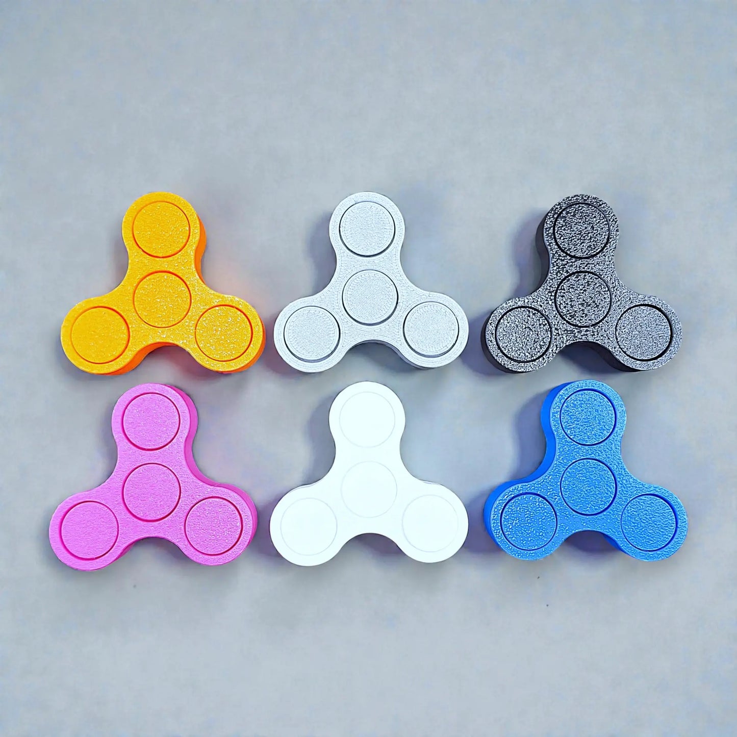 Handmade and customizable mini fidget spinners, ideal for quiet, stress-relieving play, anxiety relief and focus.