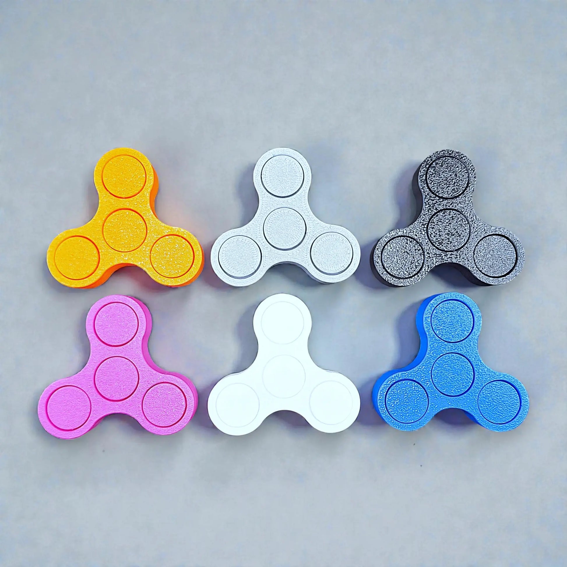 Handmade and customizable mini fidget spinners, ideal for quiet, stress-relieving play, anxiety relief and focus.