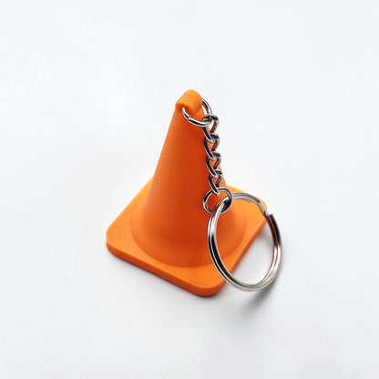 Traffic cone keychain, showing detailed shape and eco PLA material, ideal for gag gifts or themed sets.