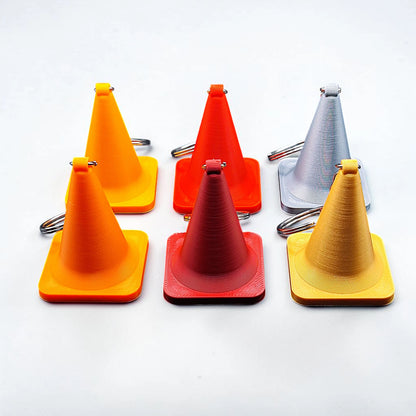 Traffic cone keychains, showing detailed shape and eco PLA material, ideal for gag gifts or themed sets.