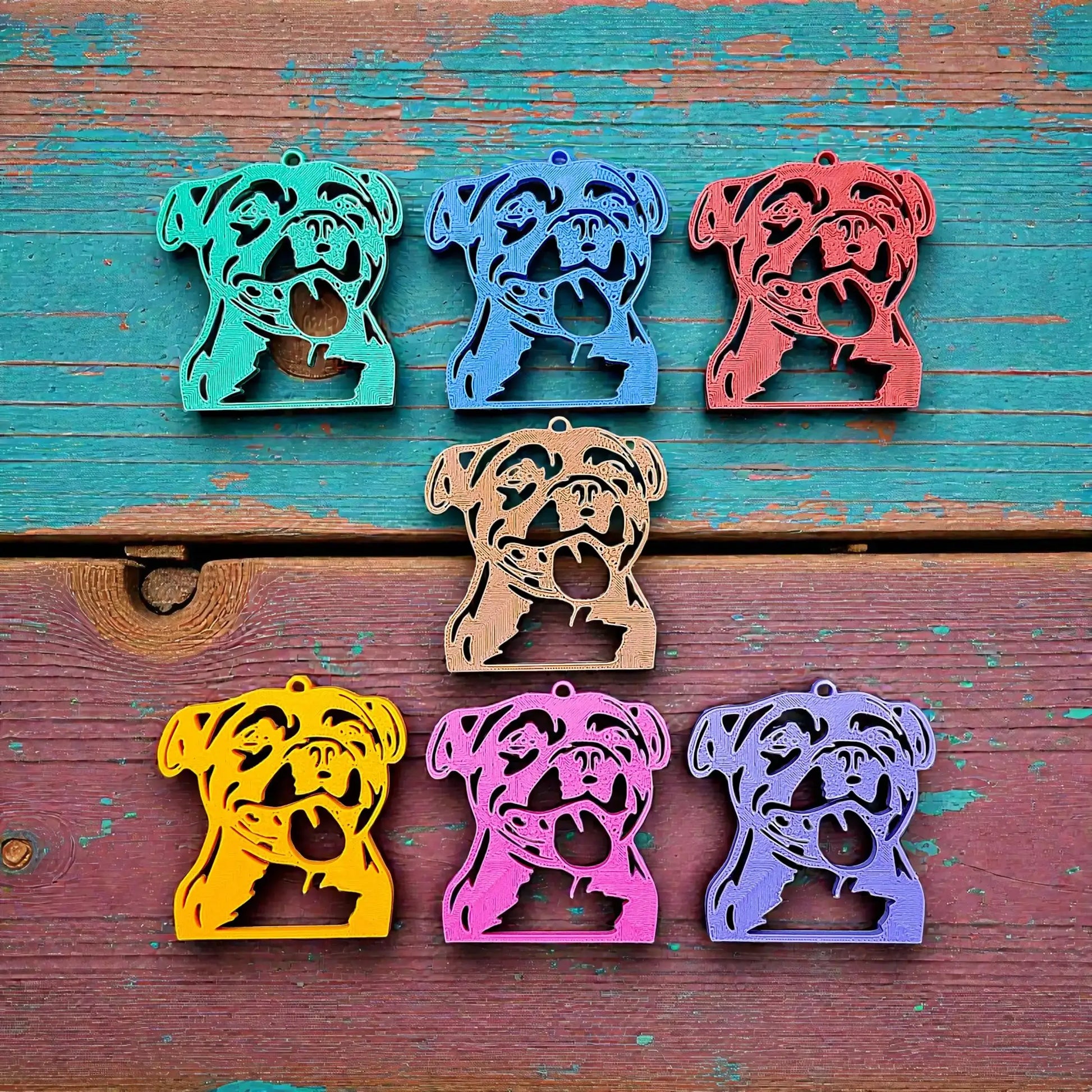 Reverse of handmade and customizable pit bull keychains in multiple colors, perfect for pittie owners, pitbull lovers, party favors, and unique bag charms.