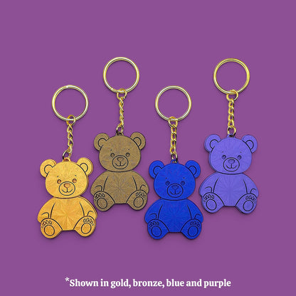 Colorful teddy bear keychains in various colors - handmade eco-friendly charms perfect for kids, baby showers, party favors, or animal-themed gifts.