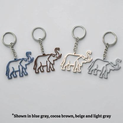 Safari elephant keychains in various colors with silver keyrings, perfect for classroom prizes, party favors for kids birthdays, baby showers and unique stocking stuffers.